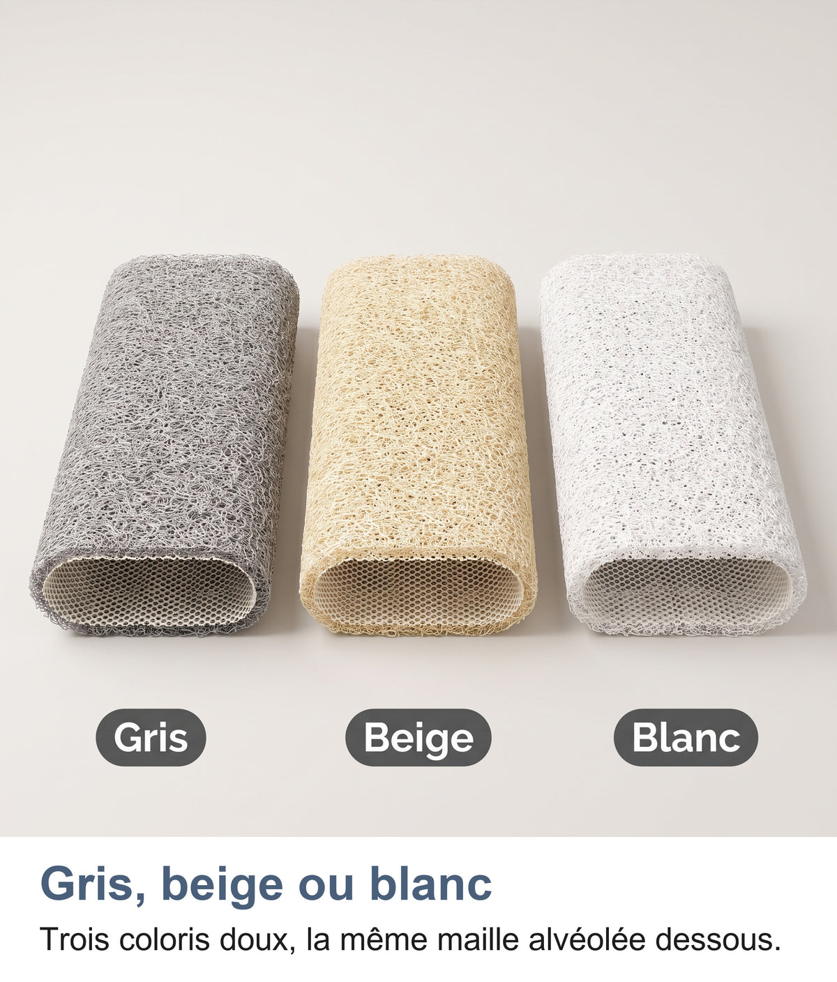 Les trois coloris roulés côte à côte : gris, beige et blanc