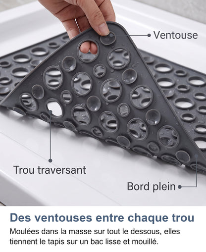 Dessous du tapis retourné : ventouses, trou traversant et bord plein