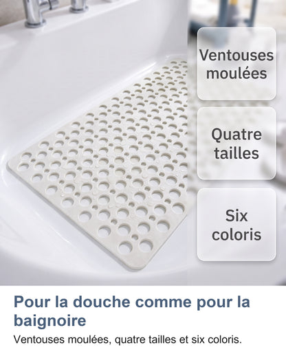 Tapis blanc dans une baignoire : ventouses moulées, quatre tailles, six coloris