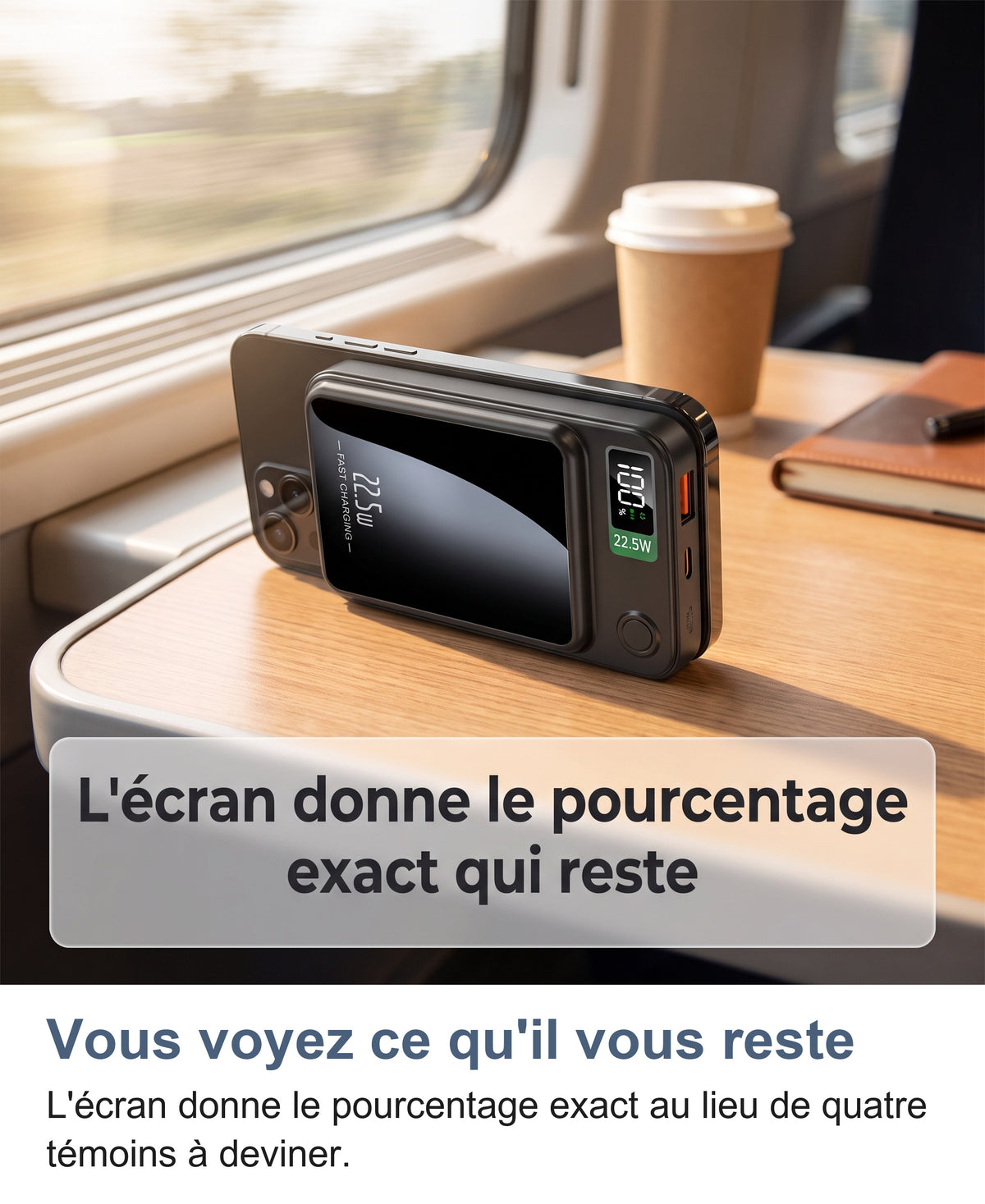 Batterie externe posée sur la tablette d'un train, pourcentage restant à l'écran