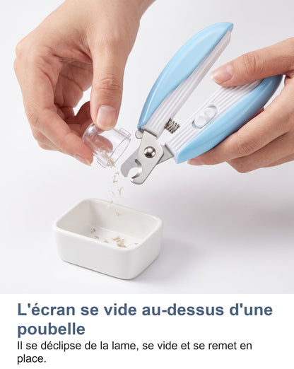 L'écran transparent du coupe-griffes se vide au-dessus d'une poubelle