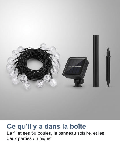 Ce qu'il y a dans la boîte Le fil et ses 50 boules, le panneau solaire, et les deux parties du piquet.