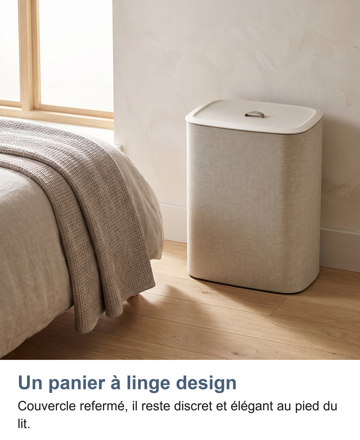 Panier à linge design au pied du lit dans une chambre